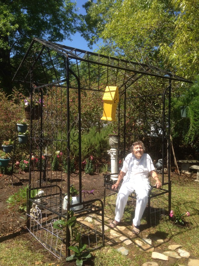 Mother sitting in yard