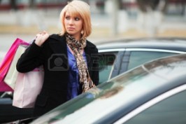 11861286-young-shopper-on-the-car-parking